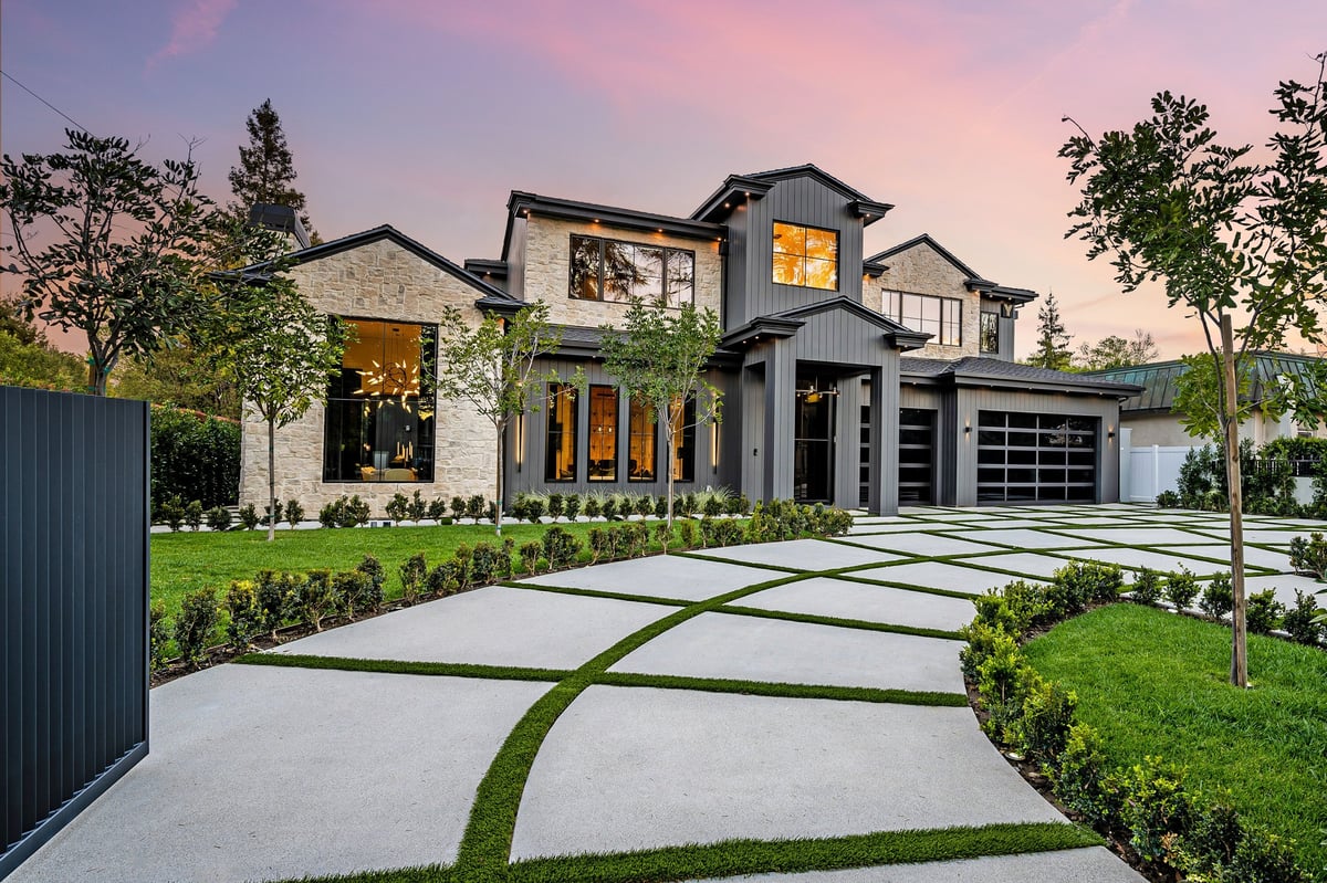 Modern home exterior with a well-manicured lawn